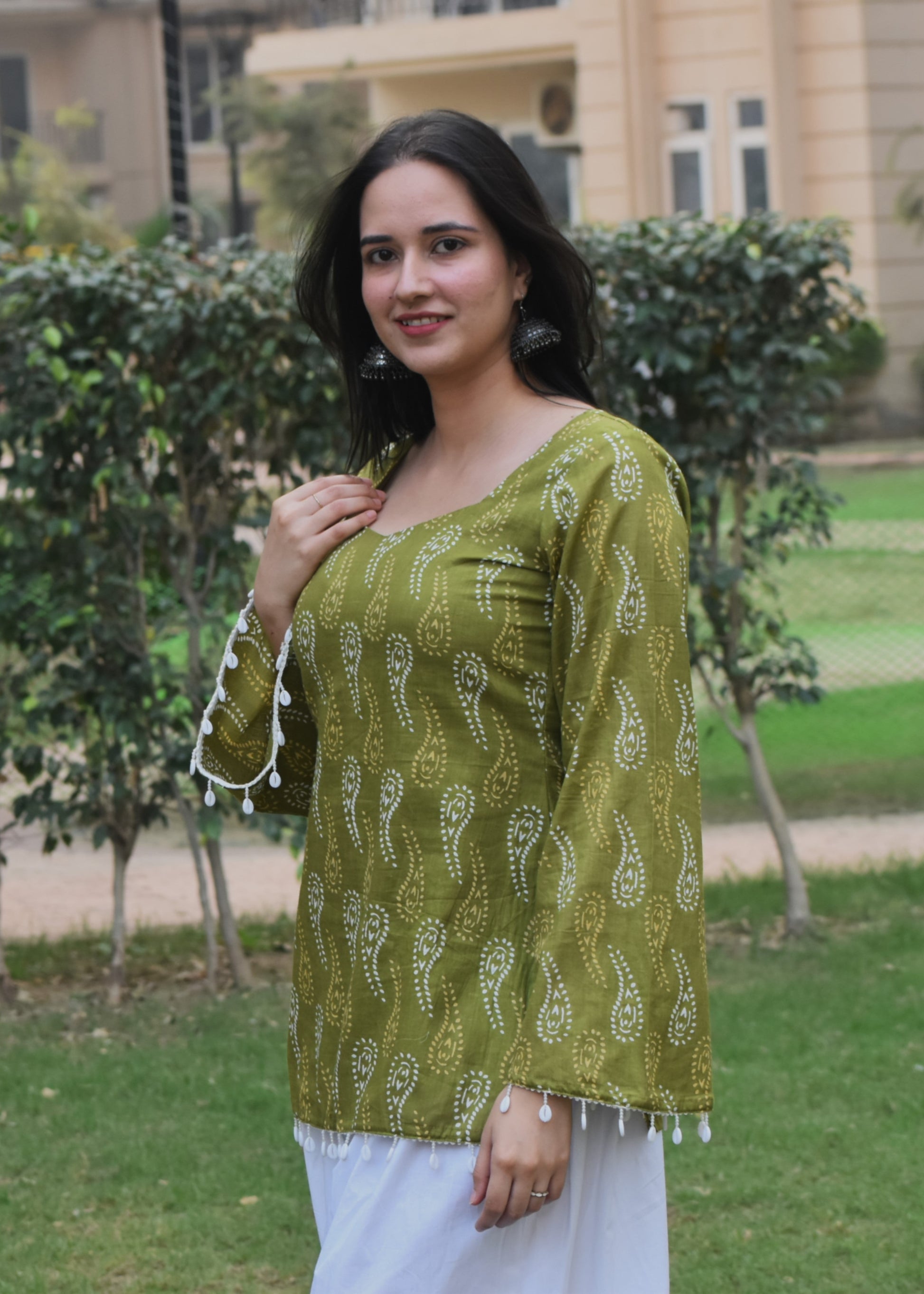 green bell sleeved short kurti with shell detailing- House of Sifar
