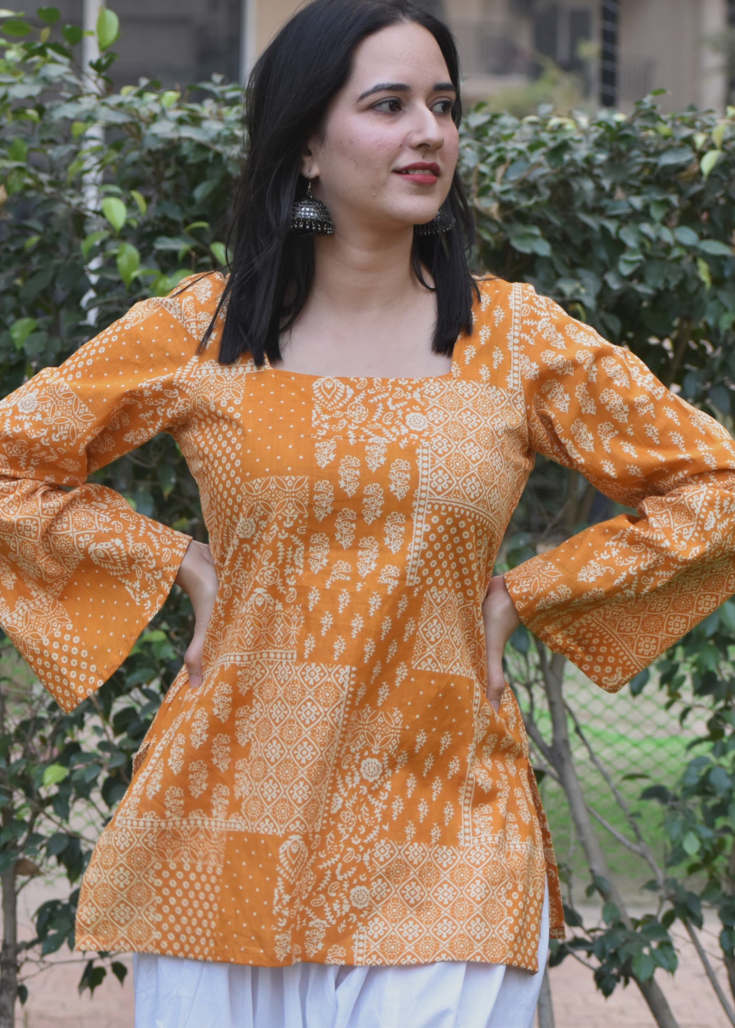Yellow square neck geometric print bell sleeved short kurti