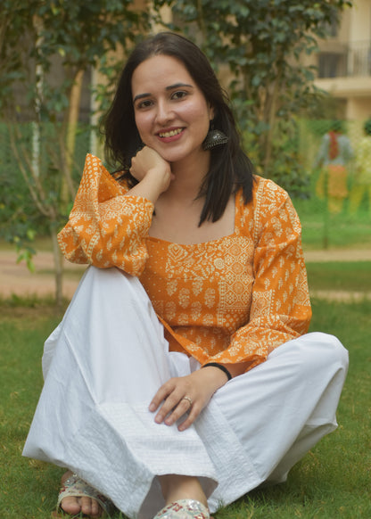yellow and white bell sleeved short kurti