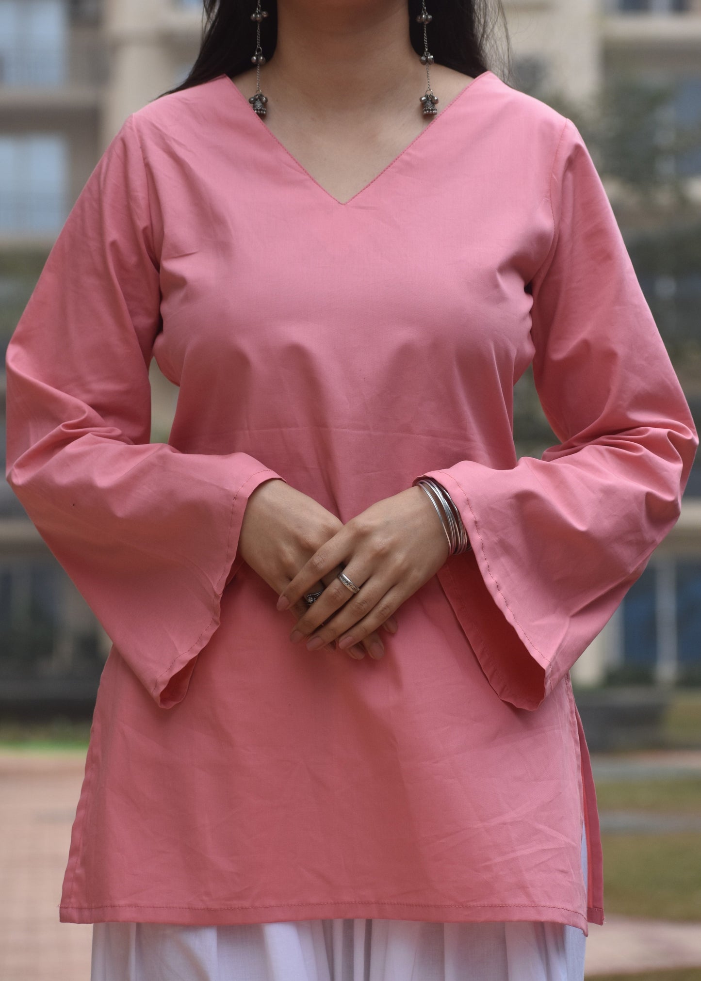 pink plain short kurti with bell sleeves