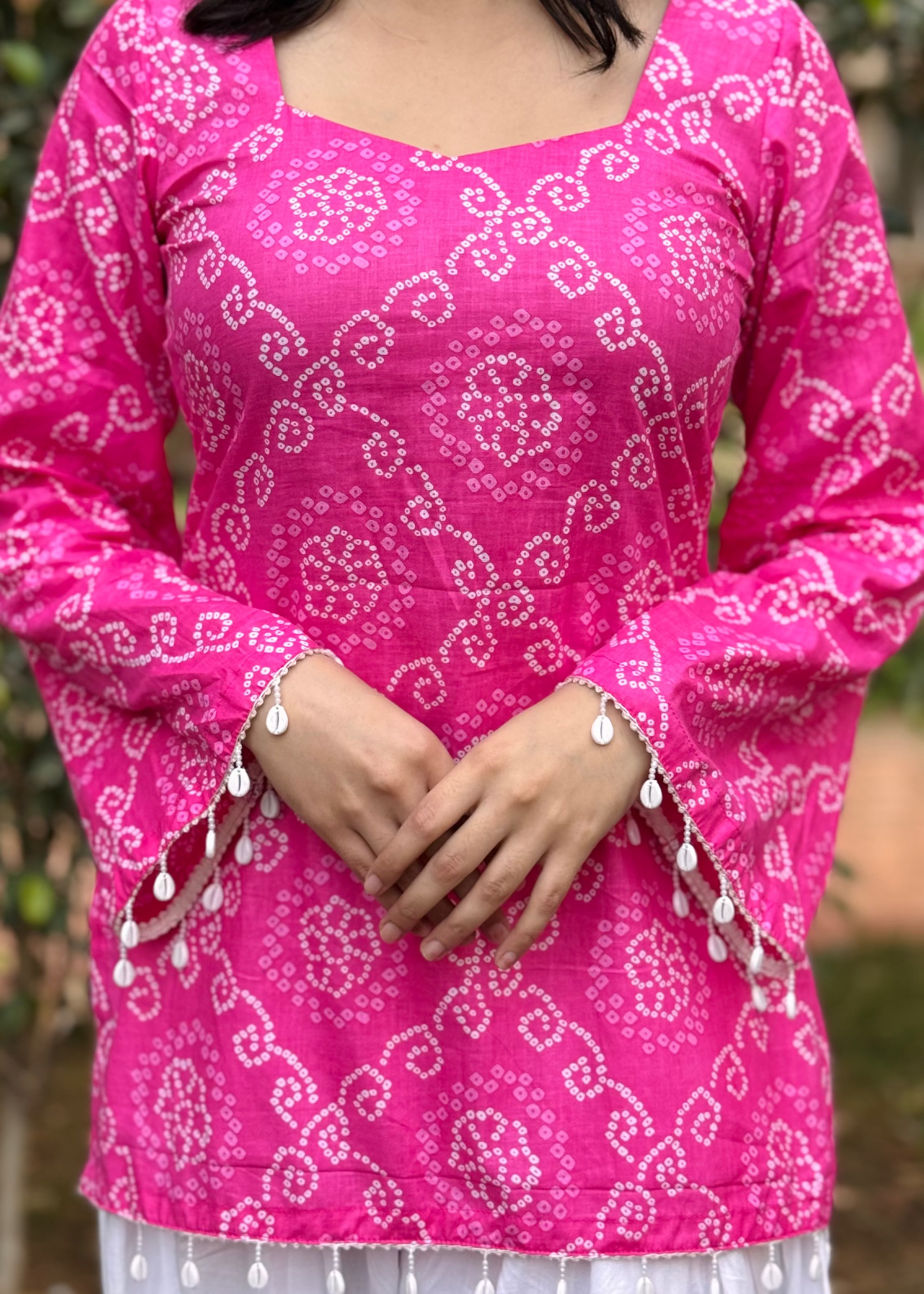 pink and white traditional bandhani print short kurti 