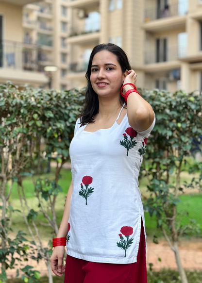 white and red short kurti with tie up neckline and half sleeves (rose print)